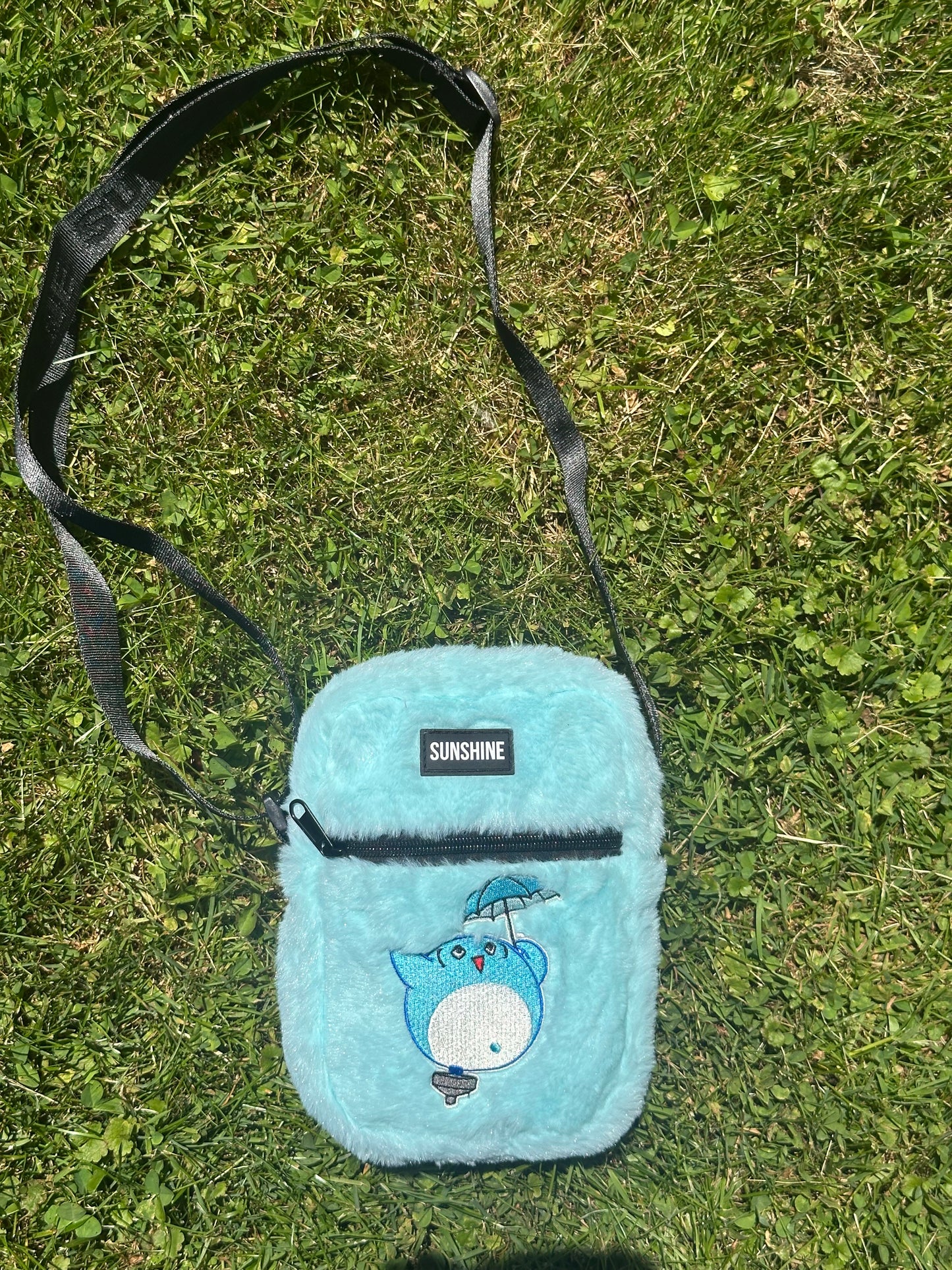NURTURE FURRY SLING BAG