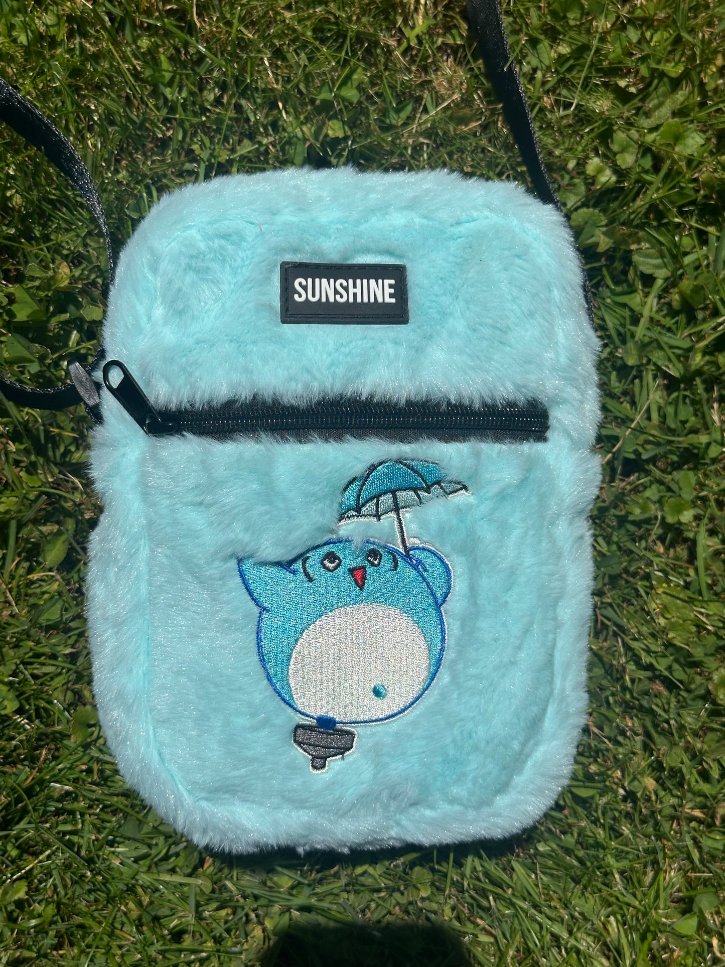 NURTURE FURRY SLING BAG