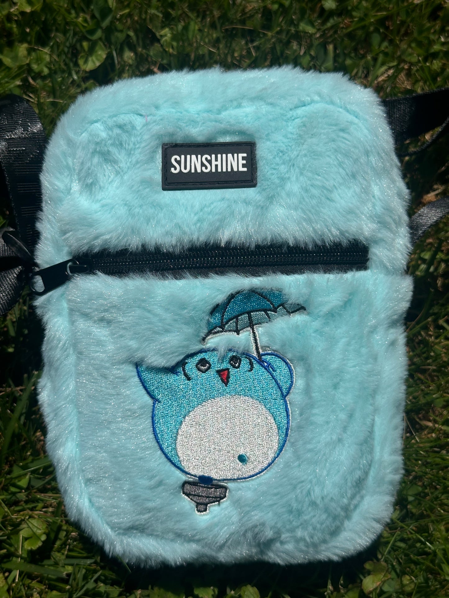 NURTURE FURRY SLING BAG