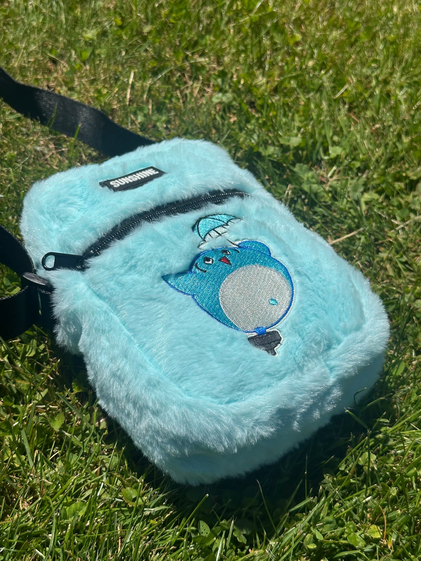 NURTURE FURRY SLING BAG